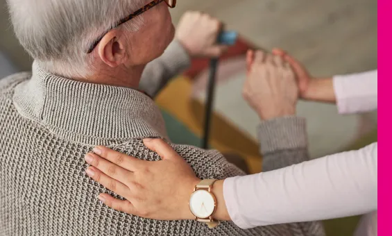 hand on elderly man's shoulder