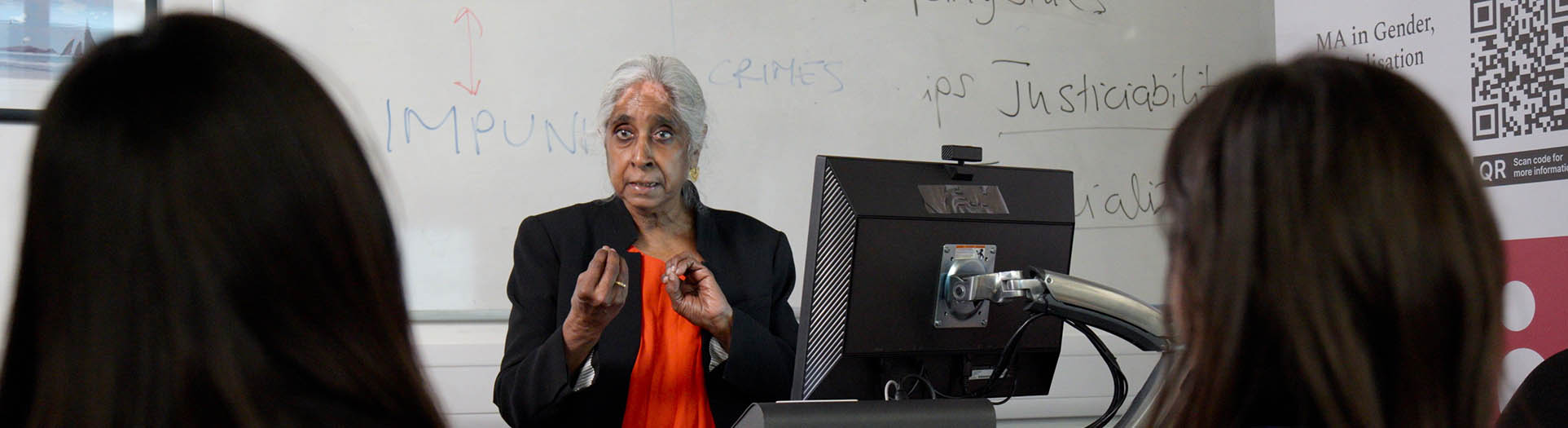 Lecturer teaching a class Gender Globalisation