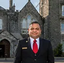 Student in front of Hotel